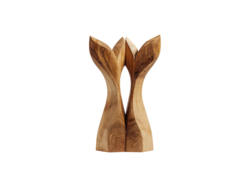 A wooden sculpture of two whale tails