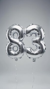 Silver balloon number 83 for birthday or anniversary party