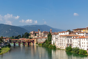 view to historic skyline of Bassano del Grappa with the Old wooden Bridge, also called ponte degli Alpini, Italy