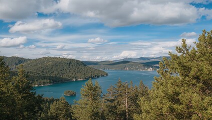 This breathtaking view features beautiful blue waters beneath a cloudy sky, ideal for adventure tourism
