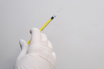 A medical syringe with a needle placed on an isolated background. Concept A sterile injection tool presented for healthcare-related use.