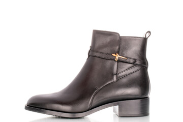 Leather women's demi-season boots isolated on white background, close-up