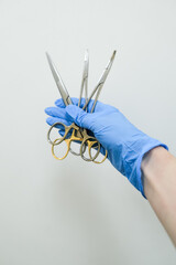 Surgical tool curved forceps with white background, isolated photo