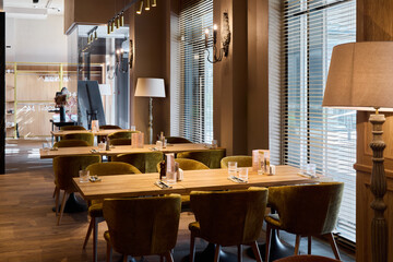 restaurant doorway scene with staff, entrance area featuring host and welcoming atmosphere