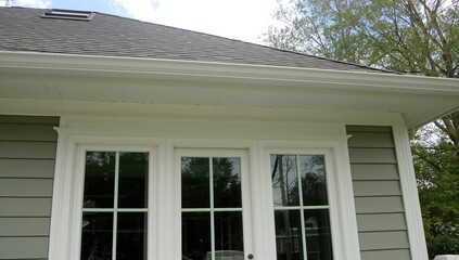 White soffit ensuring proper ventilation for roof overhangs, efficiency
