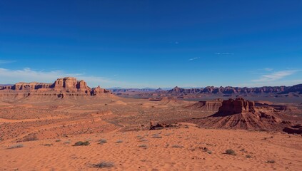 Naklejka premium Red Rock Canyon landscape under a clear sky, showcasing seasonal change