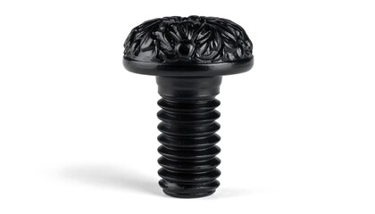 Black decorative screw with floral-patterned head and short threaded shaft on white background