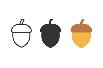 Obraz premium Three different types of acorns are shown in black, white, and yellow. The black acorn is the most prominent, with the white and yellow acorns being smaller and less noticeable