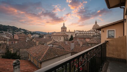 Obraz premium Scenic balcony view overlooking a charming town with an ancient church, seasonal change