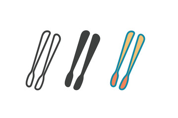 Obraz premium Three different colored toothbrushes are shown in a row. The black and white toothbrushes are next to each other, and the orange toothbrush is in the middle