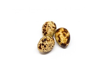 Three Spotted Quail Eggs Isolated on Clean White Background