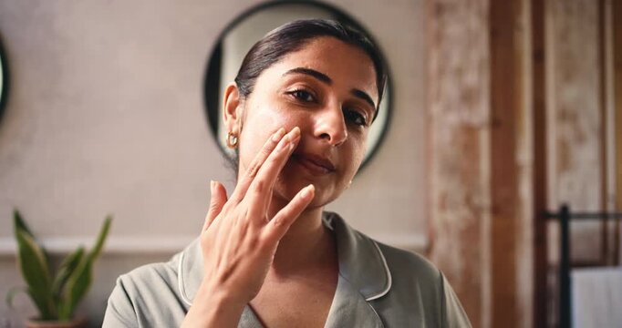 Happy woman, face and bathroom with mirror for skincare morning, lotion or moisturizer in home. Portrait, female person or facial cream with smile in POV for beauty, cosmetics or treatment in house