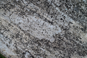 Rough Gray Concrete Surface with Dark Weathered Stains