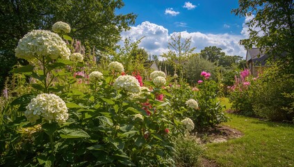 Obraz premium Natural garden hydrangeas and assorted flowers backdrop, seasonal change