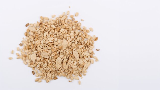 Mixed organic grains and cereals on a white backdrop, beneficial food ingredient for healthy meals - Powered by Adobe