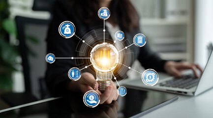 A vibrant representation of business innovation highlighting a light bulb surrounded by icons, symbolizing creativity and technology for modern solutions and growth. Crux