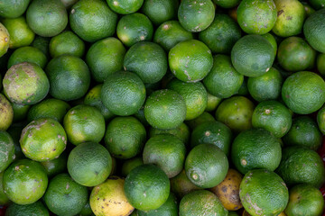 fresh limes on market stall