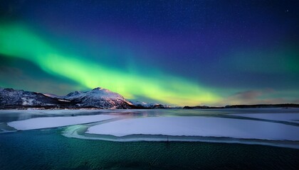 aurora borealis over frozen lake