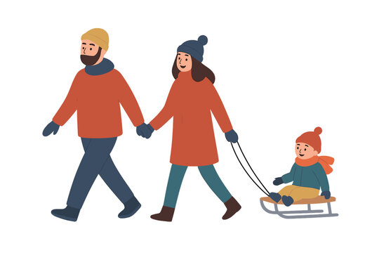 Happy family walking in warm winter clothes pulling their smiling child on a wooden sled