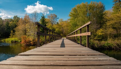 Close-up of a footbridge traversing a creek, highlighting erosion risk