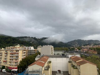 Obraz premium Colorful Villagescape with Mountain Vista