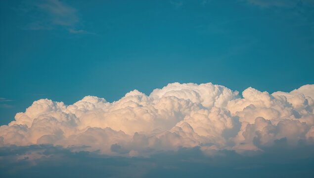 Fototapeta Sky filled with fluffy clouds, ideal backdrop for creative projects