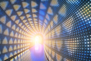 Abstract light tunnel in the recreational park. Many small colorful lighting bulbs decorated.