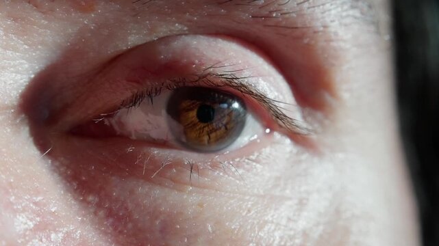 low light brown eye caucasian man in contemplative nocturnal scene, soft shadow and catchlight create cinematic intimacy, subtle tearline and skin texture visible, conveys insomnia, reflection