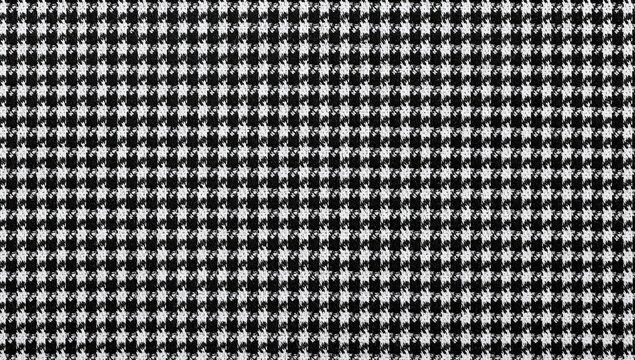Sample of houndstooth fabric in black and white, ideal for textile design