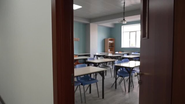 School classroom after class, view through the door
