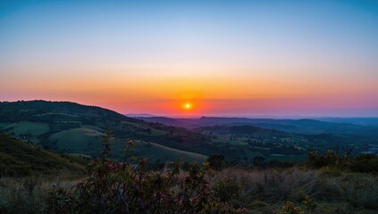 Fototapeta premium Sunset view over hills in nature, seasonal change