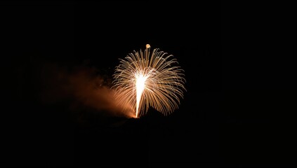 Fototapeta premium Long exposure capture of fireworks illuminating a silhouette on a mountain with the moon in the backdrop, featuring elements of travel, nature, and light.