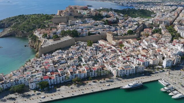 Aerial View of Dalt Vila (Eivissa Old Town) and the Busy Boat and Ferry Marina in Ibiza, Balearic Islands	