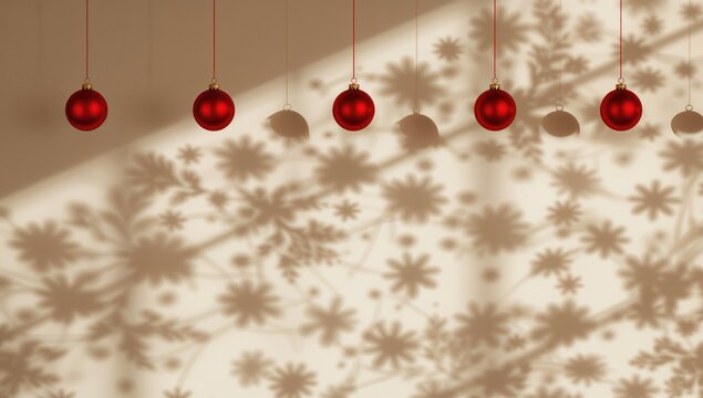 A string of red Christmas ornaments hangs from above, casting shadow patterns on the wall that suggest a stylized Christmas tree, holiday season - Powered by Adobe