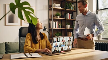A remote worker in a modern home office greets a colleague during a hybrid work video conference call, with a gentle parallax camera move revealing a lush monstera plant.