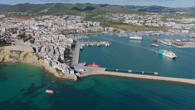 Aerial View of Dalt Vila (Eivissa Old Town) and the Busy Boat and Ferry Marina in Ibiza, Balearic Islands	