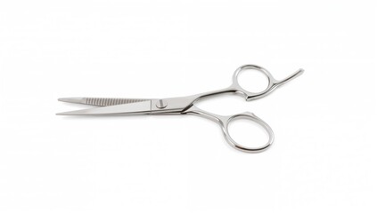 Obraz premium Small stainless steel scissors on a white backdrop, suitable for precision tasks, grooming, or craft projects