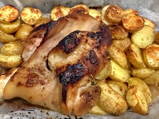 Potatoes and pork knuckle cooked at home