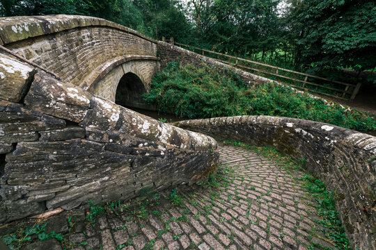 A 19th century spiral bridge spanning the Macclesfield Canal at Bollington, Cheshire, UK
