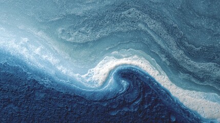 Swirling shades of blue create an ocean of abstract beauty. Captivating wave patterns blend light and dark, evoking tranquility and depth in this seascape, it's so soothing.