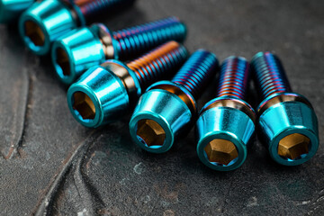 Titanium bicycle bots on a black textured background