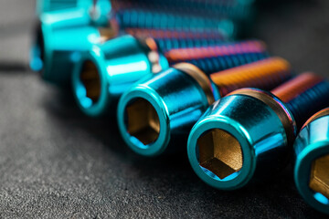 Titanium bicycle bots on a black textured background