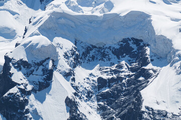 High Mountains with avalanche eaves