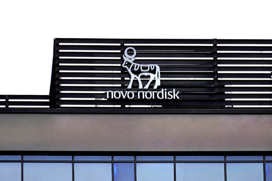 Novo Nordisk logo on the top of an office building.