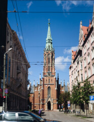 Fototapeta premium Riga Old Town view, Latvia, streets of Vecriga historical center with Town Hall square, House Of The Black Heads, Cathedral and church, travel to Latvia and Baltic States, summer day with a blue sky