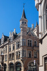 Fototapeta premium Riga Old Town view, Latvia, streets of Vecriga historical center with Town Hall square, House Of The Black Heads, Cathedral and church, travel to Latvia and Baltic States, summer day with a blue sky