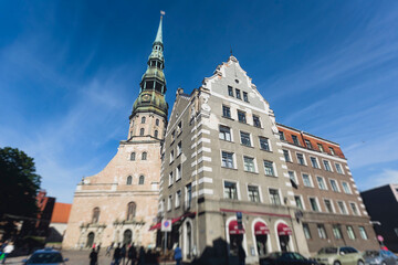 Fototapeta premium Riga Old Town view, Latvia, streets of Vecriga historical center with Town Hall square, House Of The Black Heads, Cathedral and church, travel to Latvia and Baltic States, summer day with a blue sky