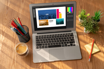 Fototapeta premium Graphic designer software for modern design of web page and commercial ads showing on the computer screen