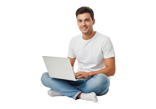 Smiling young man in casual attire sits cross legged with a modern laptop computer isolated on transparent background