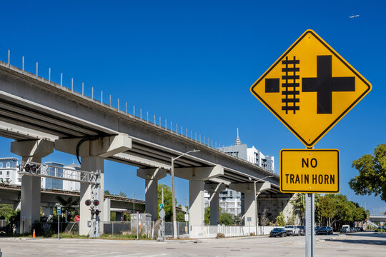 public transportation metro train railways above street in the city  